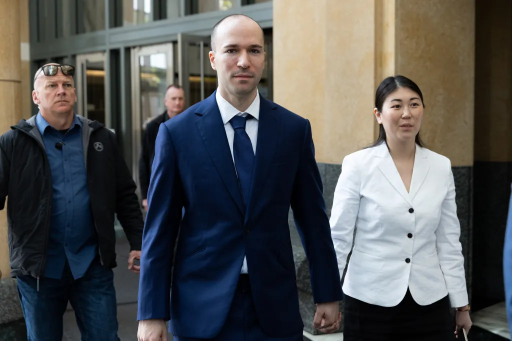 OpenAI President Greg Brockman departs the Ronald V. Dellums Federal Building.