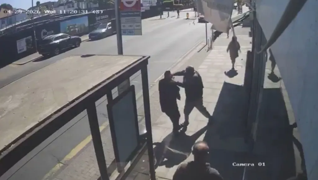 Surveillance footage shows a man stabbing two victims on a sidewalk in Golders Green, North London.
