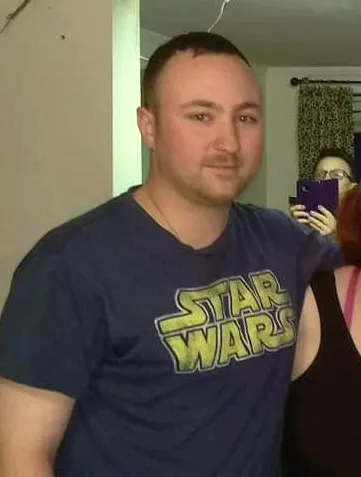 Thomas Caleb Butler wearing a Star Wars t-shirt.