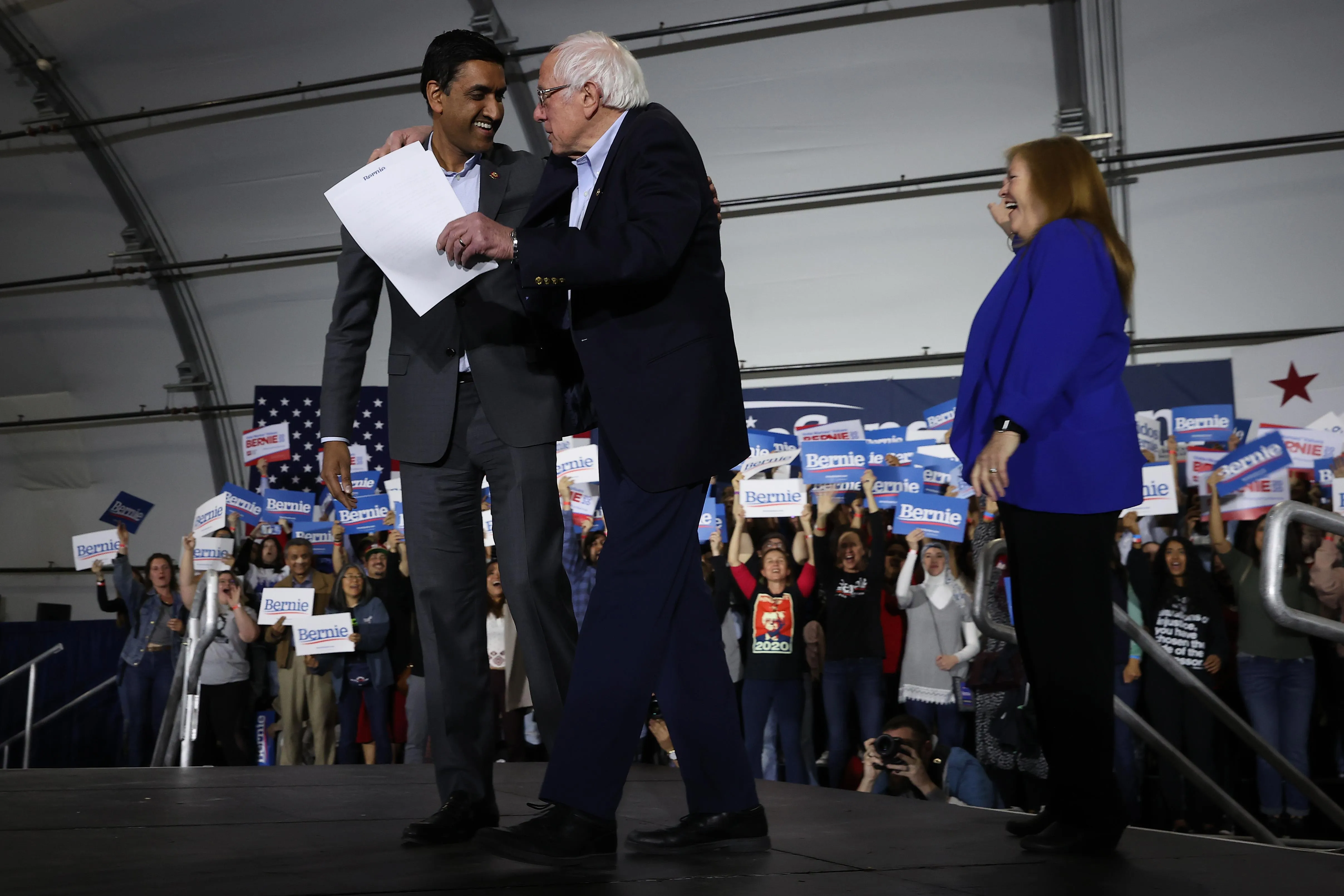 Bernie Sanders embracing Ro Khanna at a rally Bernie Sanders embracing Ro Khanna at a rally