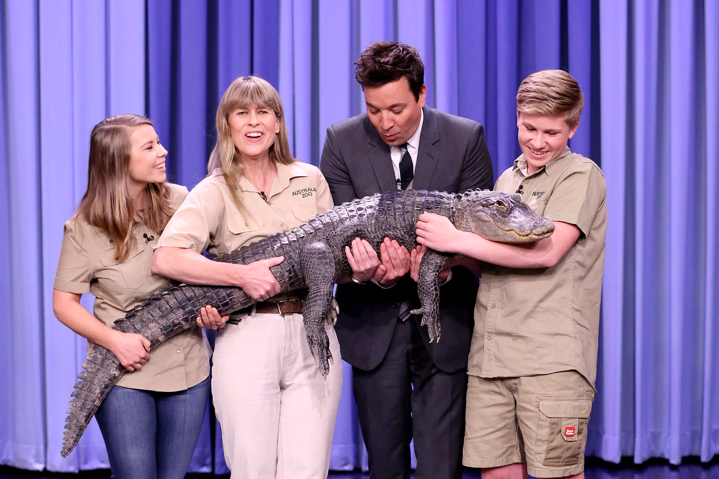 The Irwin family (Bindi, Terri, and Robert) with Jimmy Fallon holding an alligator on "The Tonight Show."