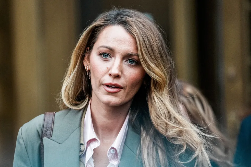 Actress Blake Lively leaves the courthouse.