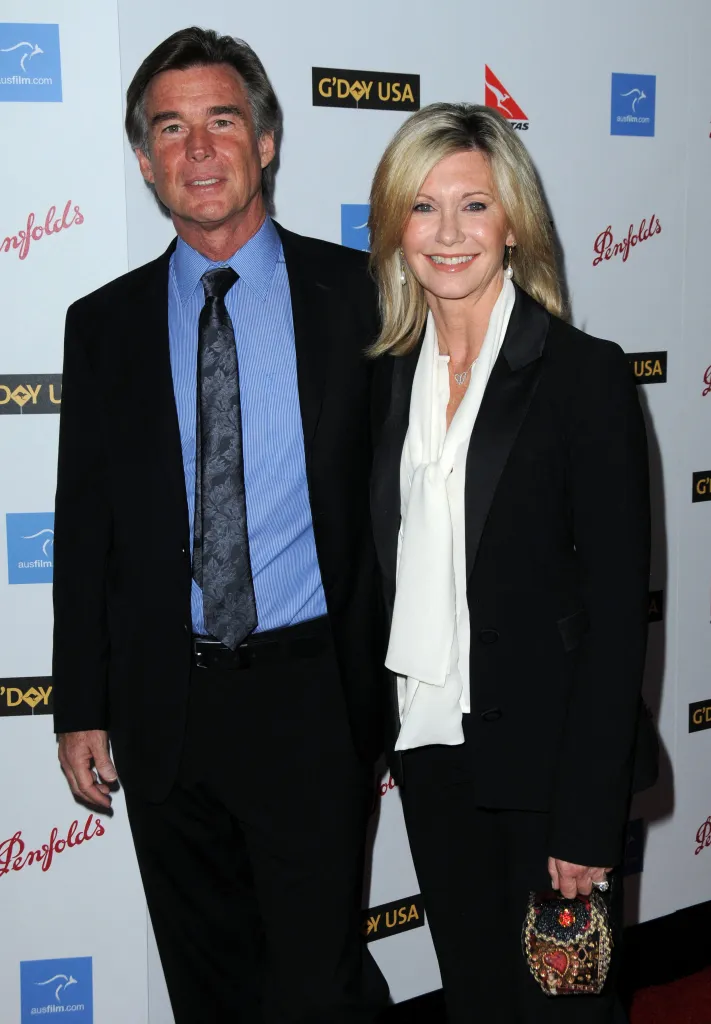 Actress Olivia Newton-John and her husband John Easterling posing at the G'Day USA Australia Week 2009 Gala.