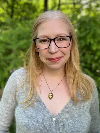 Aimee Pokwatka smiling.