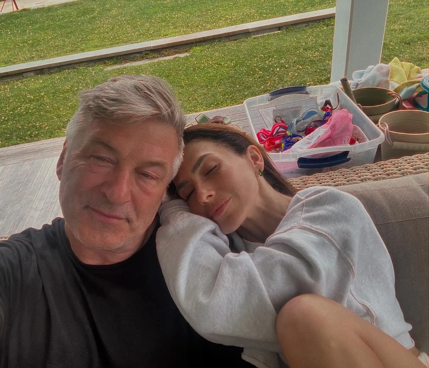 Alec and Hilaria Baldwin take a selfie, with Hilaria leaning her head on Alec's shoulder.
