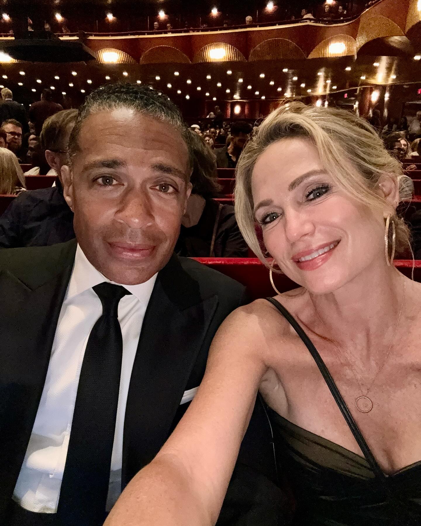 TJ Holmes and Amy Robach in formal wear, attending an event.