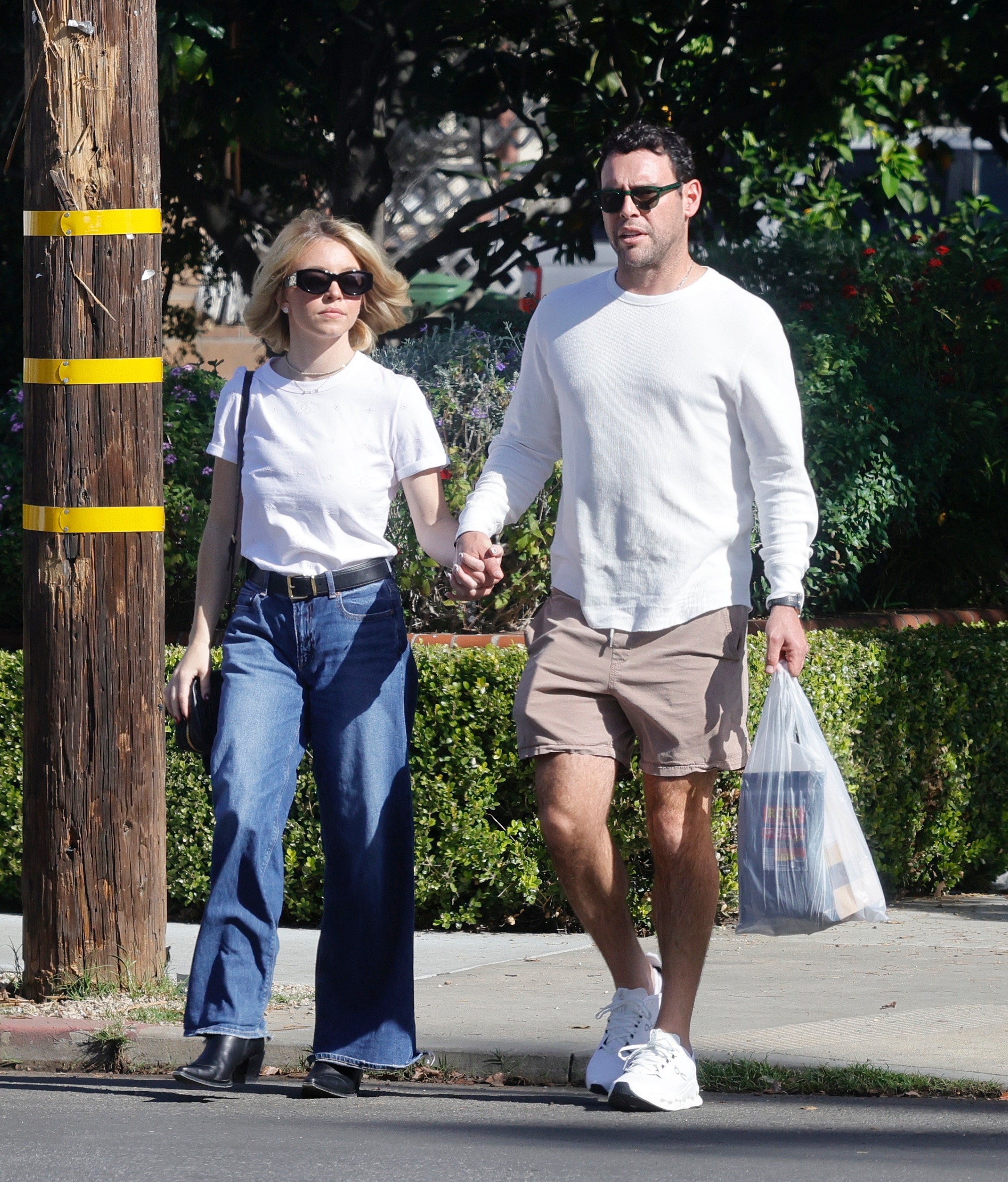 Sydney Sweeney and Scooter Braun walking hand-in-hand in Brentwood.