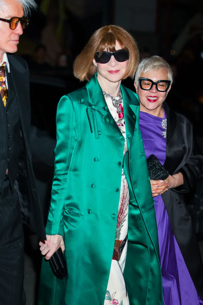 Anna Wintour and Baz Luhrmann with a third person at a Met Gala pre-party.