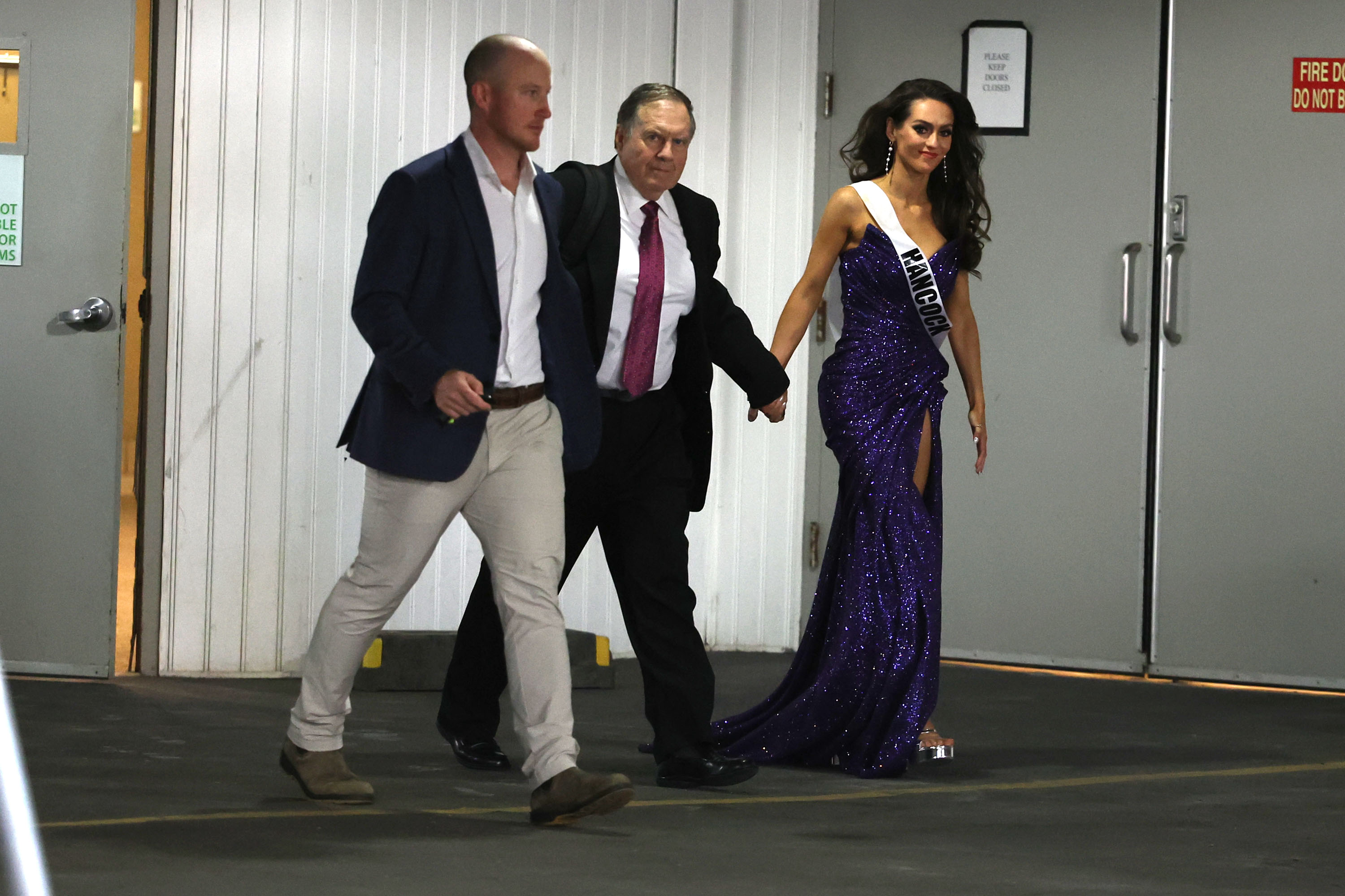 Bill Belichick and Jordon Hudson leave the Holiday inn in Portland ,Maine