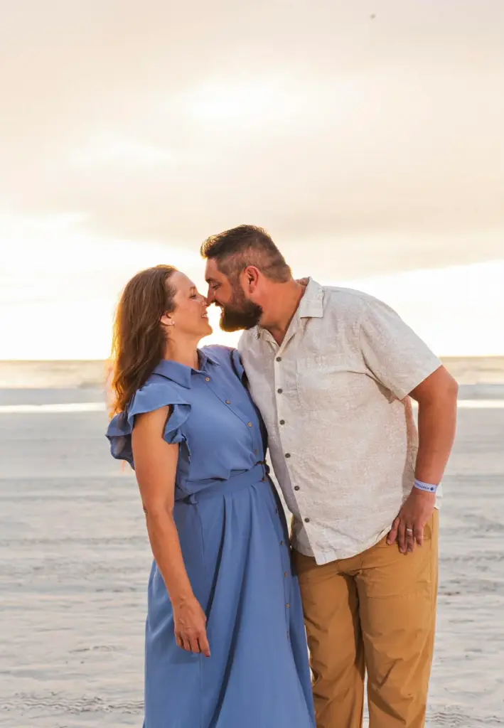 Brooke Hinderhan with a man, standing on a beach