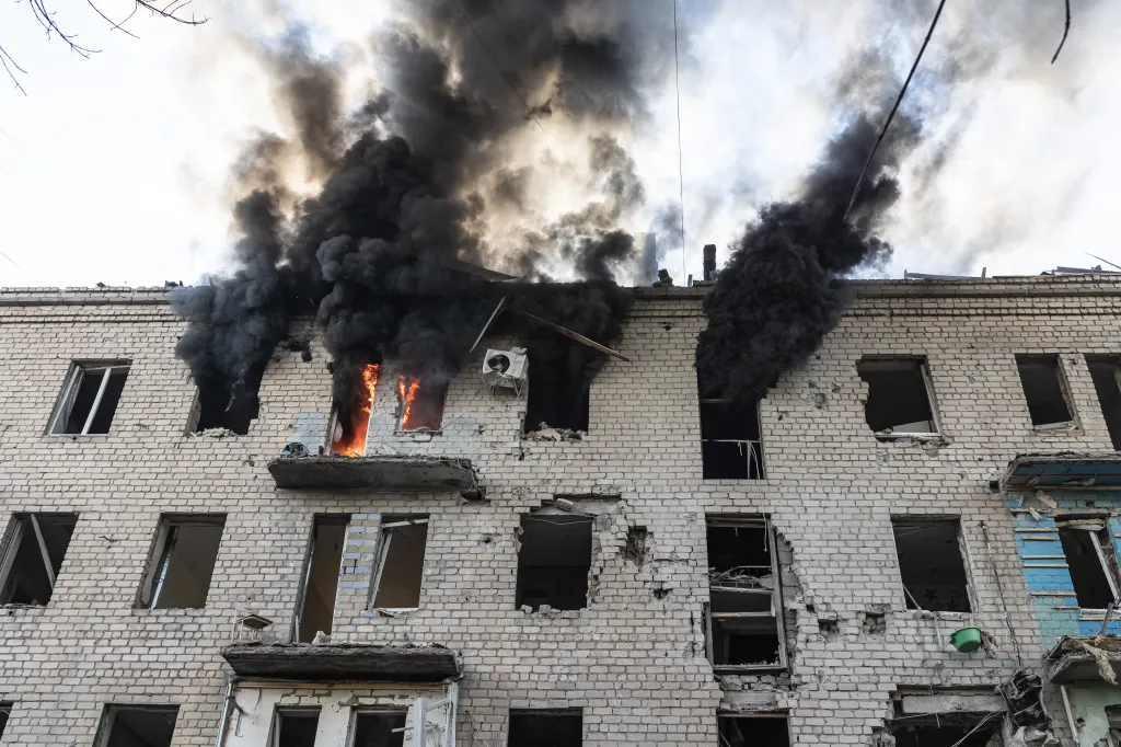 A residential building in Kramatorsk, Ukraine, engulfed in flames and thick black smoke after a Russian attack.