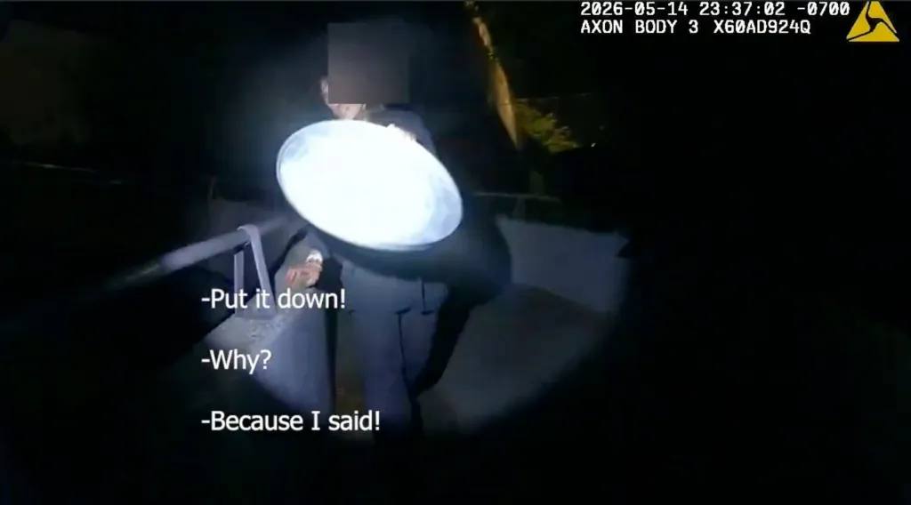 Timothy Reed was holding a metal garbage can lid when confronted by police.