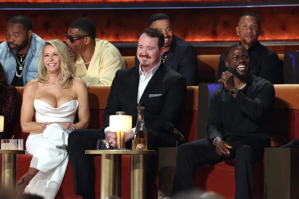 Chelsea Handler, Shane Gillis, and Kevin Hart laugh together at the Netflix Is A Joke Festival.