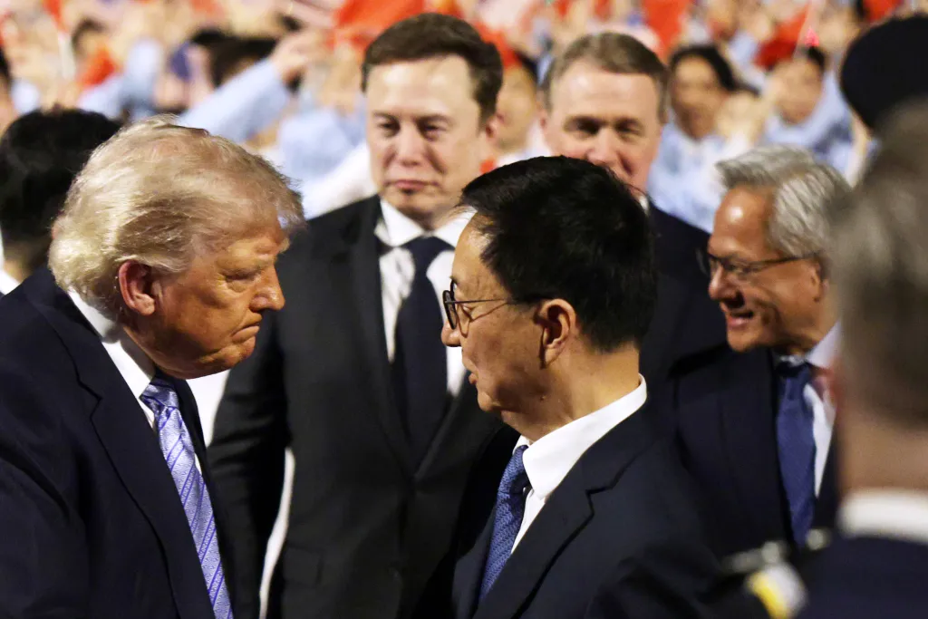 Donald Trump greets Han Zheng, with Elon Musk, David Perdue, and Jensen Huang looking on.