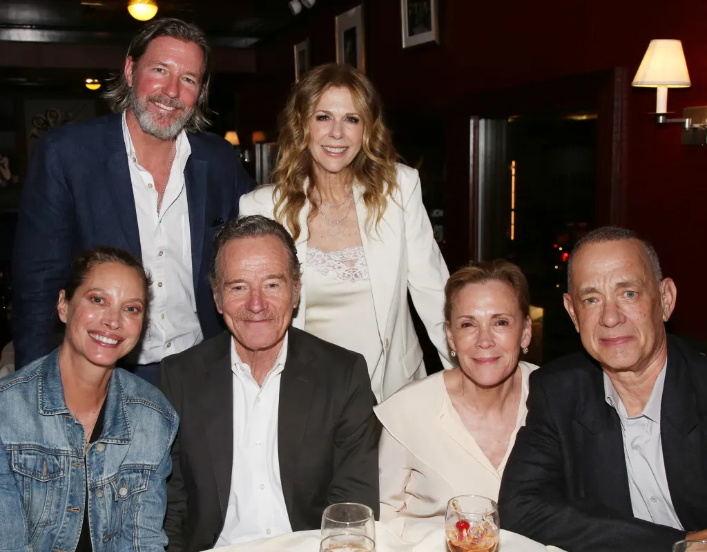Christy Turlington, Ed Burns, Bryan Cranston, Rita Wilson, Robin Dearden, and Tom Hanks posing at the opening night after-party for "Celebrity Autobiography".