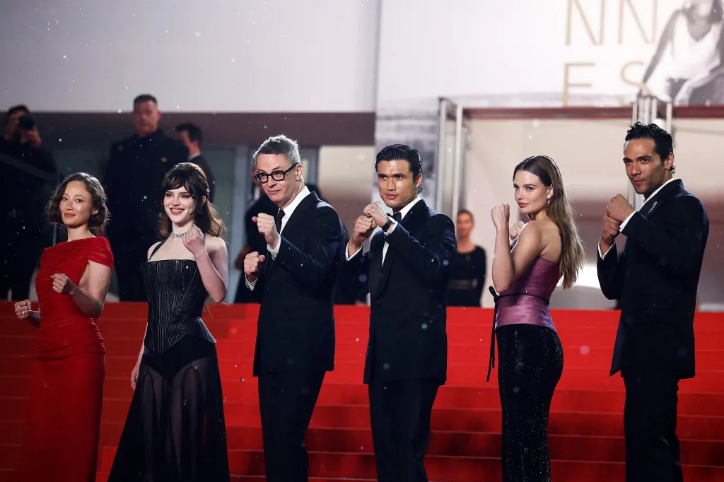 Havana Rose Liu, Sophie Thatcher, Nicolas Winding Refn, Charles Melton, Kristine Froseth, and Diego Calva pose on the red carpet during arrivals for the screening of the film "Her Private Hell" Out of competition at the 79th Cannes Film Festival.