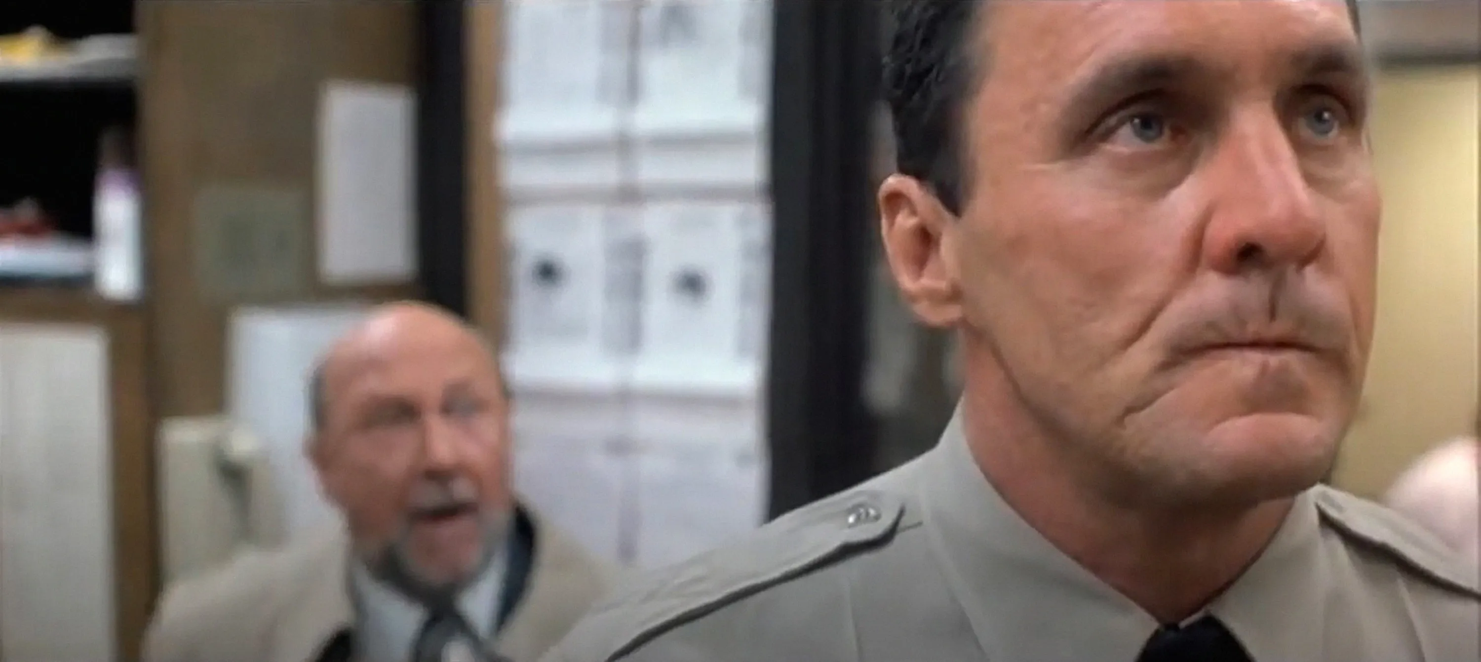 Beau Starr as Sheriff Ben Meeker and Donald Pleasence as Dr. Sam Loomis in "Halloween 5: The Revenge of Michael Myers."
