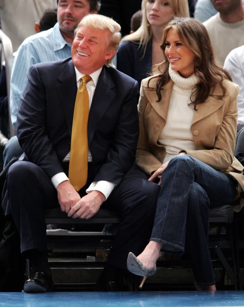 Donald Trump and Melania Trump watching a basketball game.
