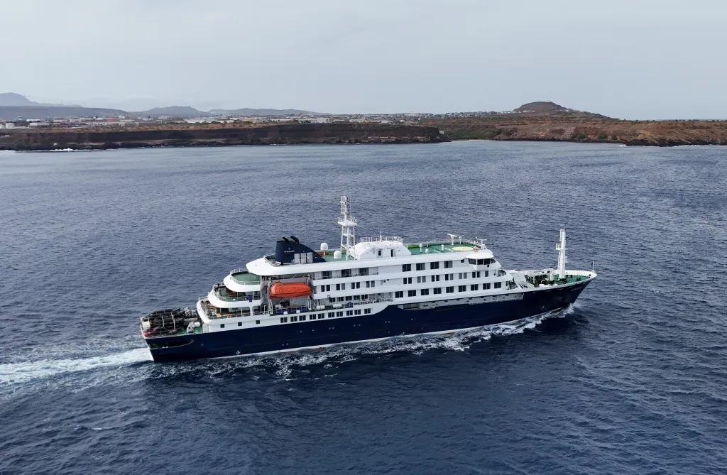 Drone view of the cruise ship MV Hondius departing Praia.