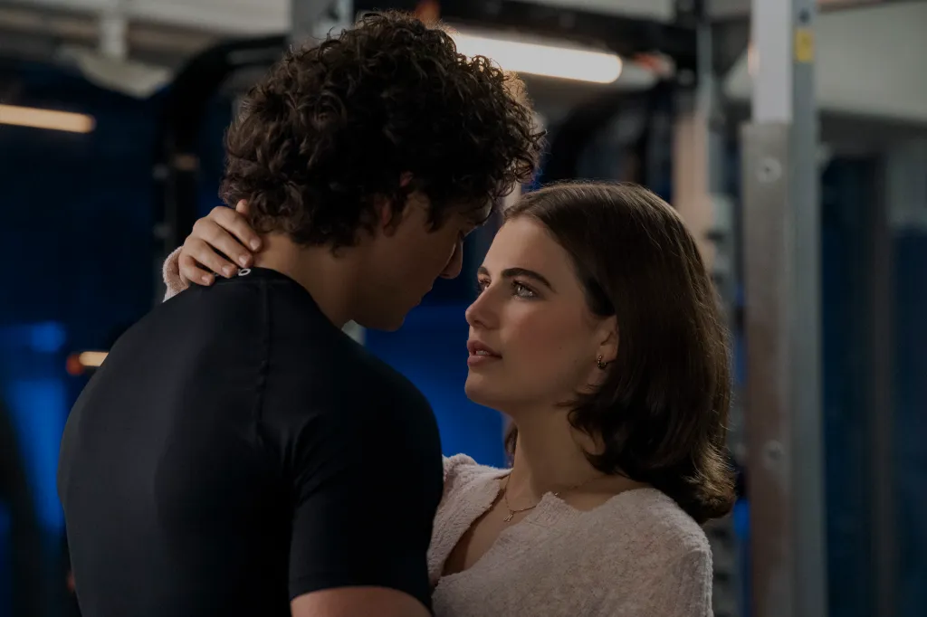 Hannah (Ella Bright) and Garrett (Belmont Cameli) holding each other in Off Campus.