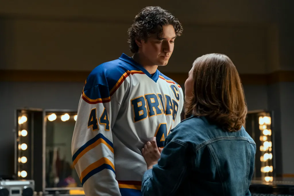 Garrett Graham and Hannah Wells looking at each other in a scene from Off Campus.
