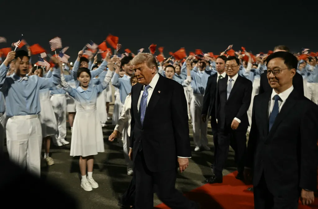 US President Donald Trump escorted by China's Vice President Han Zheng at Beijing Capital Airport.