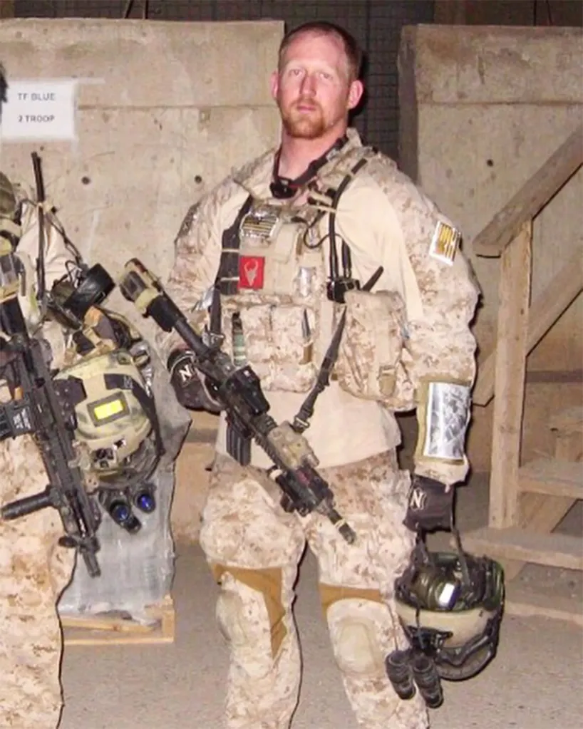 Former U.S. Navy Seal Senior Chief Rob O'Neill in desert camouflage holding a rifle.