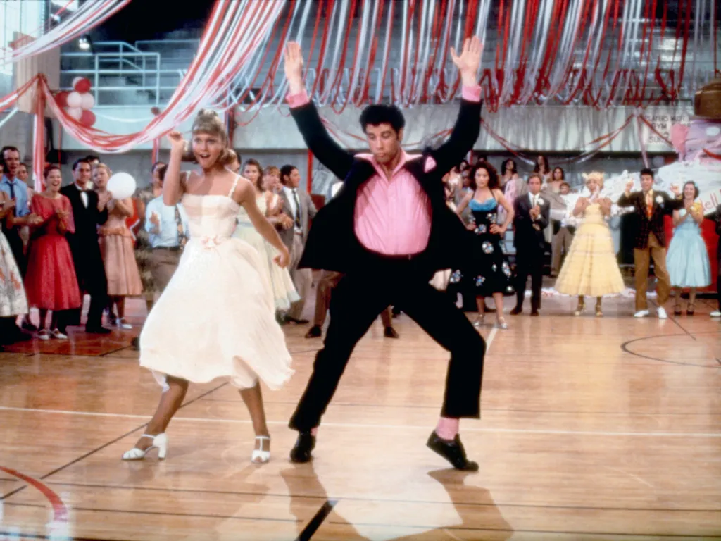 Olivia Newton-John and John Travolta dancing in "Grease."
