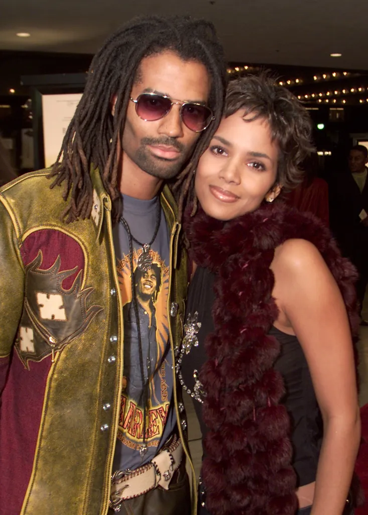 Halle Berry and Eric Benet posing together at "The Brothers" premiere.