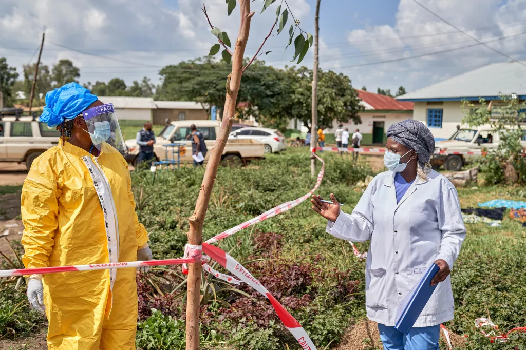 Health workers chat at an Ebola treatment center in Rwampara, Congo.