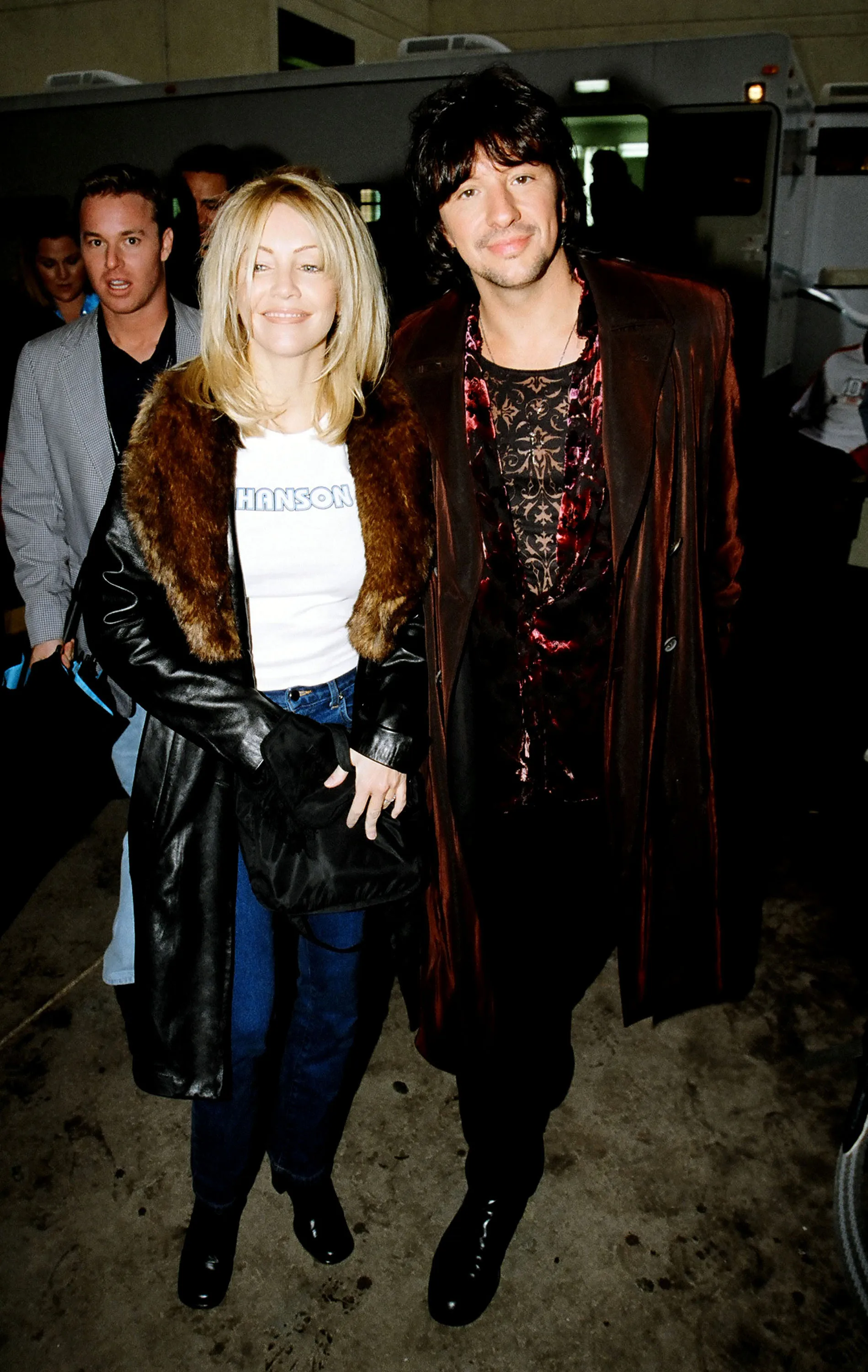Heather Locklear and Richie Sambora smiling for a photo during the 1998 Kid's Choice Awards.