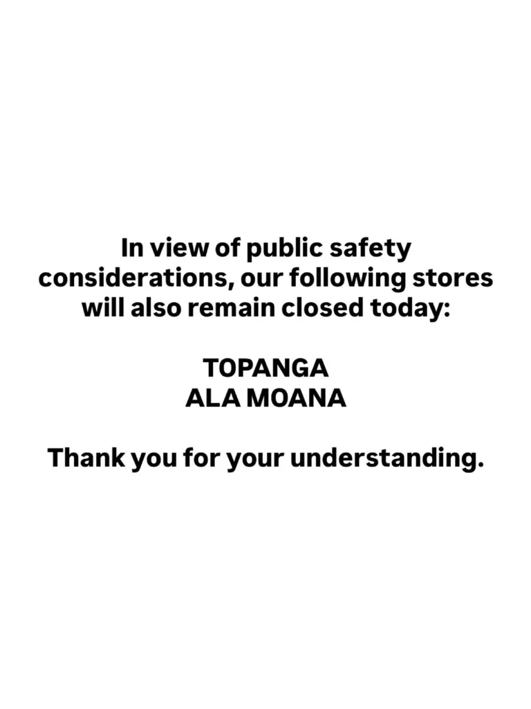 A sign on a white background reads, "In view of public safety considerations, our following stores will also remain closed today: TOPANGA ALA MOANA. Thank you for your understanding."