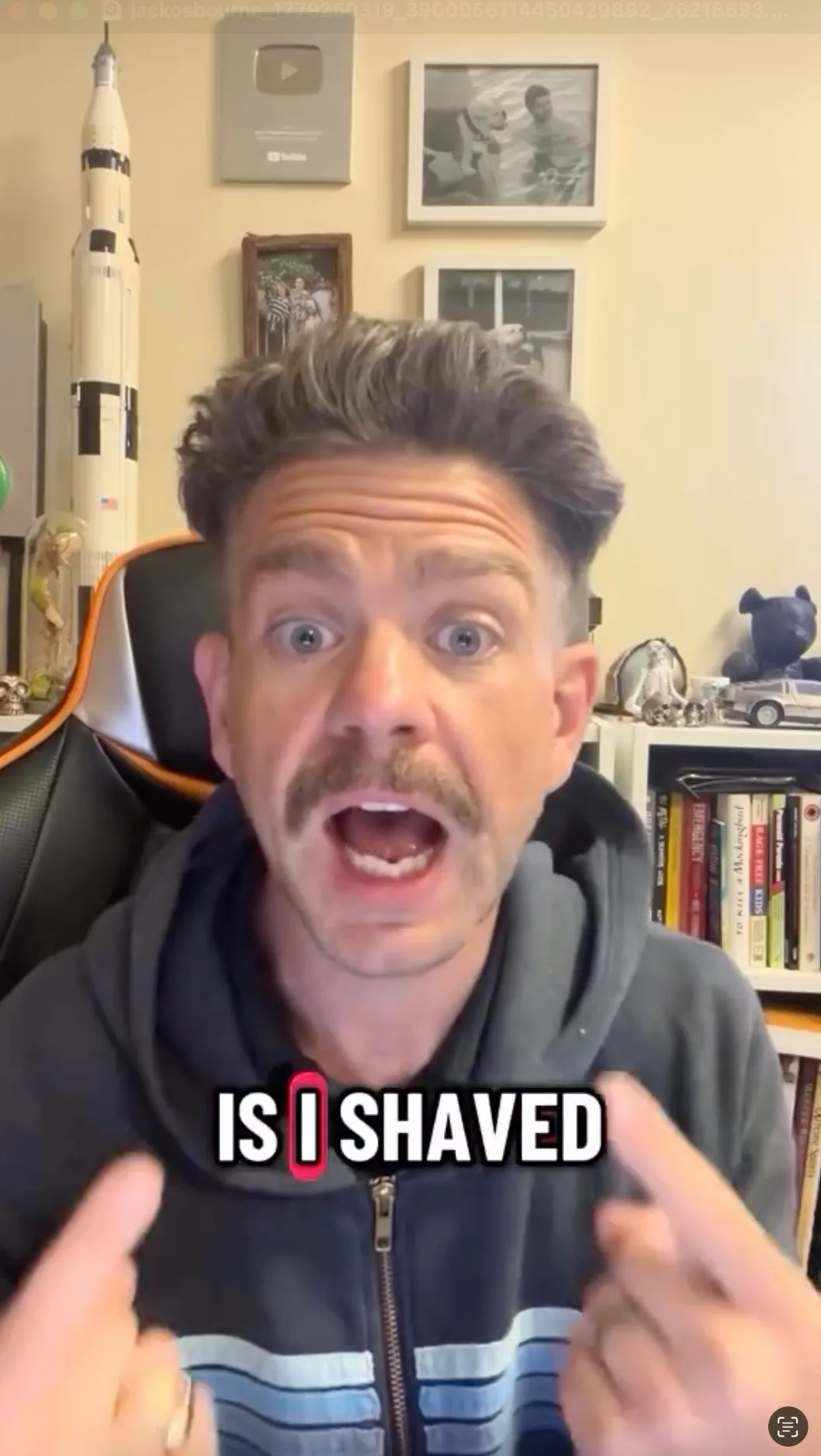 Jack Osbourne points to himself, with the words "IS I SHAVED" written across his chest, as he reacts to being called "grossly underweight."