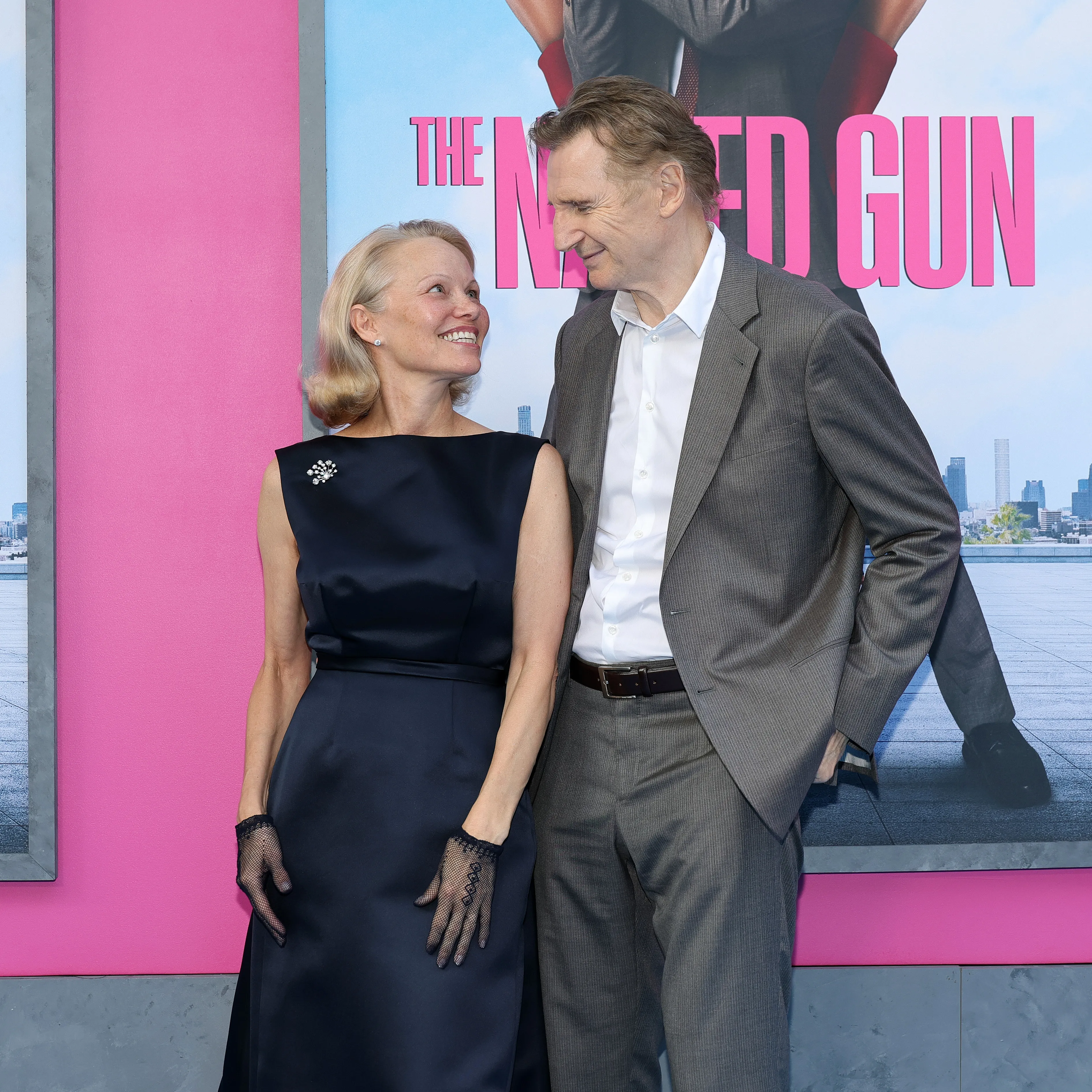 Pamela Anderson and Liam Neeson attend "The Naked Gun" New York premiere.