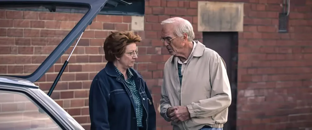 Katherine Dow Blyton and Pierce Brosnan in a scene from the movie "Giant."