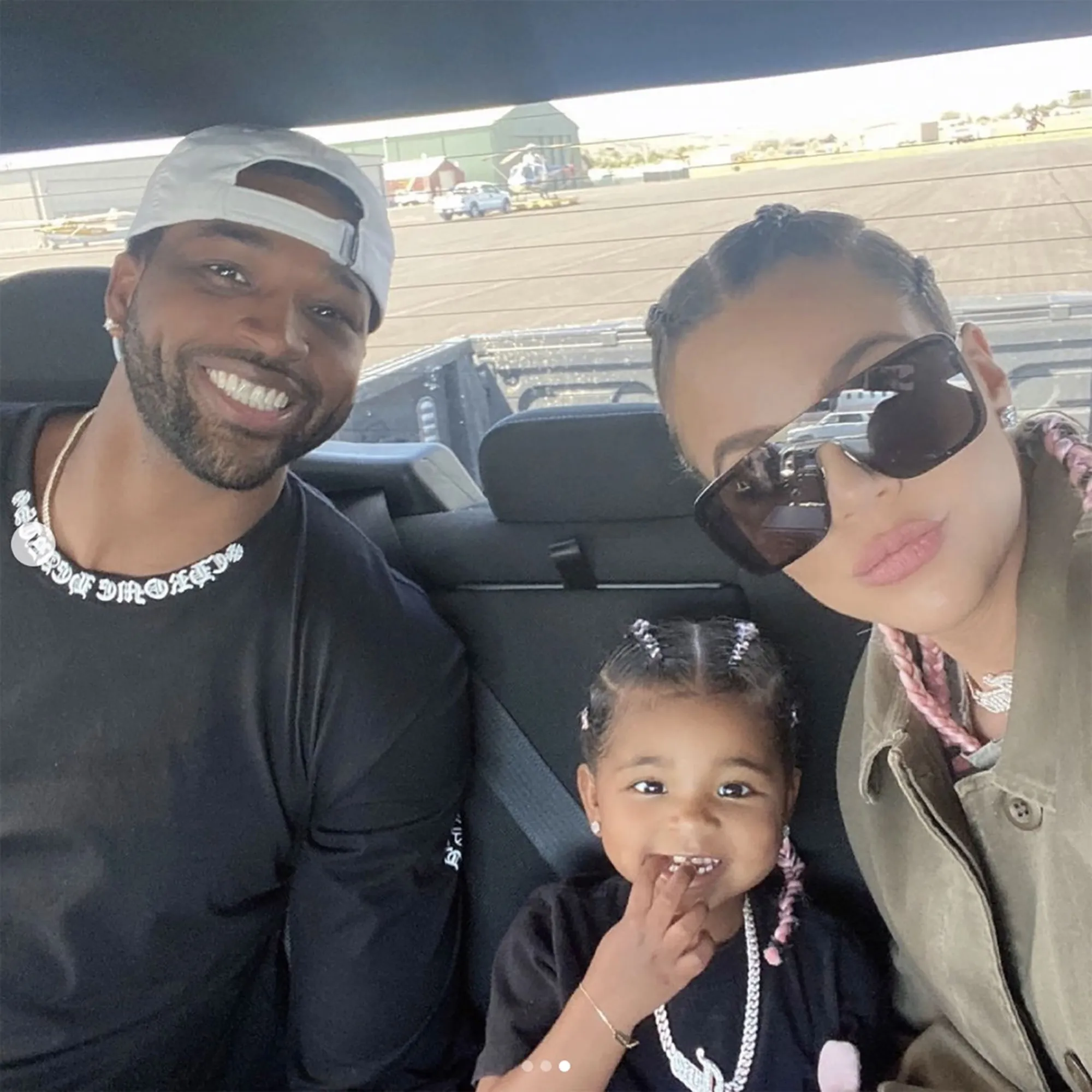 Khloé Kardashian, Tristan Thompson, and their daughter True in a car selfie.