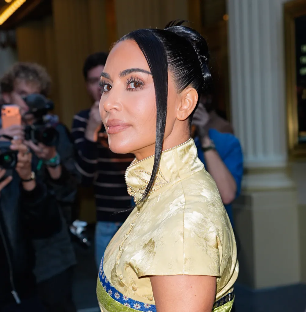 Kim Kardashian in a yellow embroidered dress with pearl details at "The Fear of 13" on Broadway.