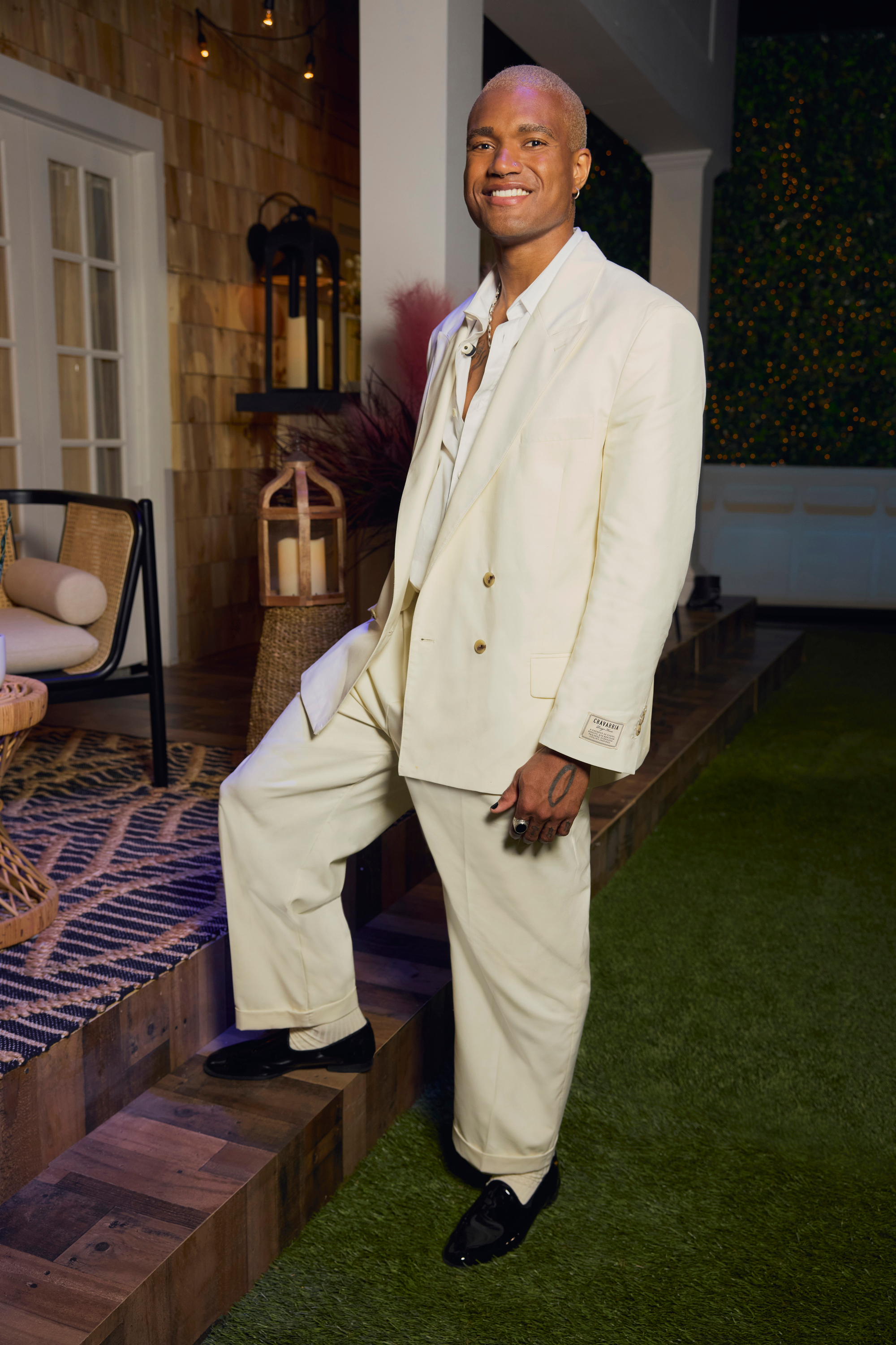 KJ Dillard in a cream suit.