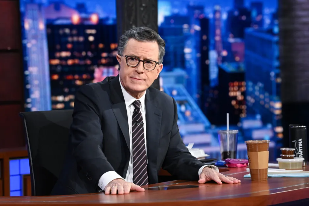 Stephen Colbert at his desk during "The Late Show with Stephen Colbert."