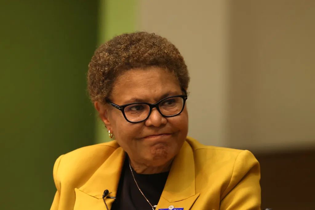 Los Angeles Mayor Karen Bass in a yellow blazer and glasses.