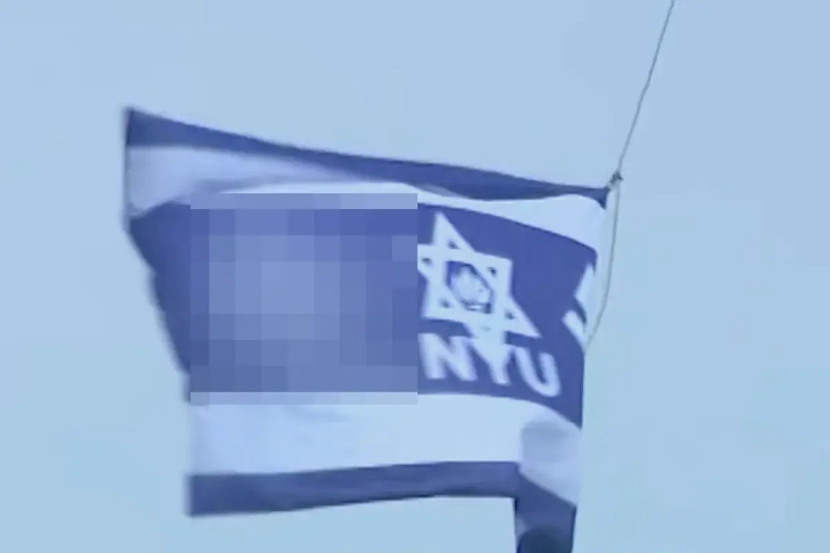 Swastika flag raised above NYU building named after billionaire Jewish causes donor during graduation week