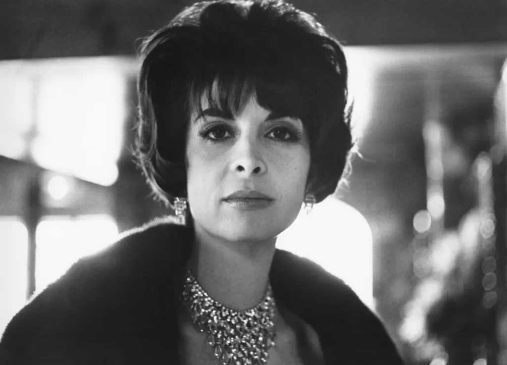 Portrait of Talia Shire in a fur stole and statement diamond necklace from The Godfather: Part II.