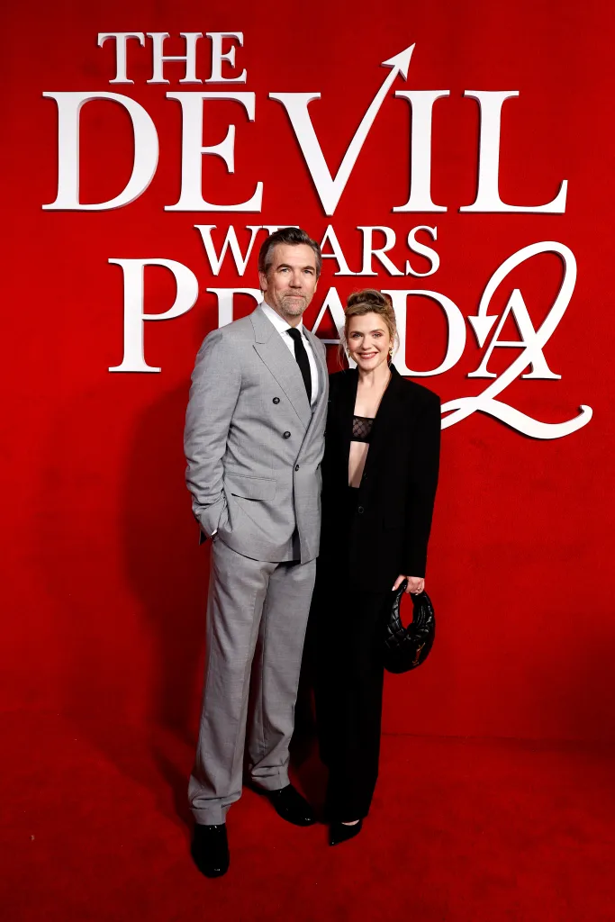 Patrick Brammall and Harriet Dyer pose at "The Devil Wears Prada 2" Sydney Gala.