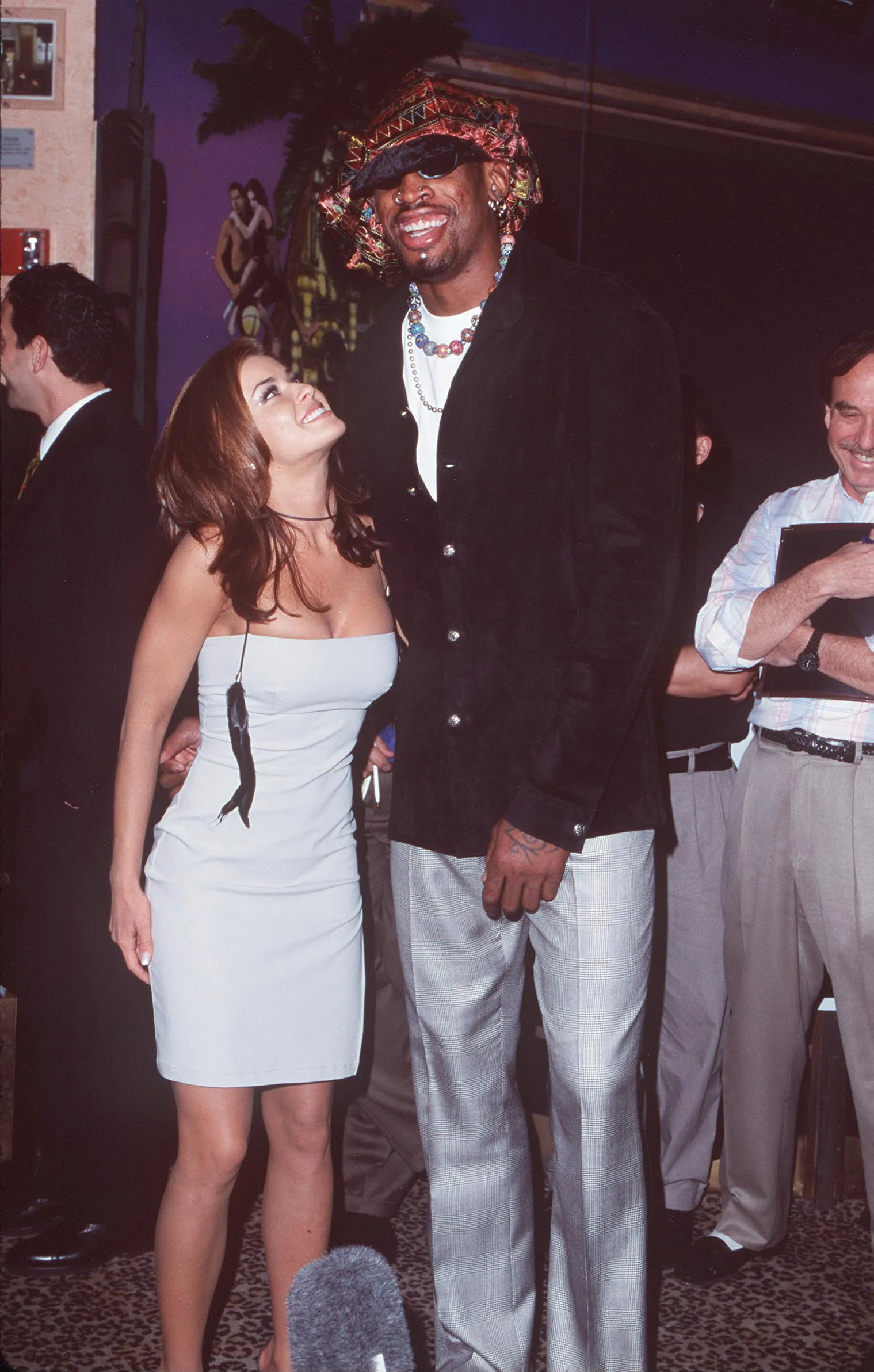Dennis Rodman and Carmen Electra at a press conference.