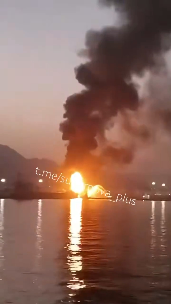 Drone strike on an oil port in Fujairah with fire and a large plume of smoke.