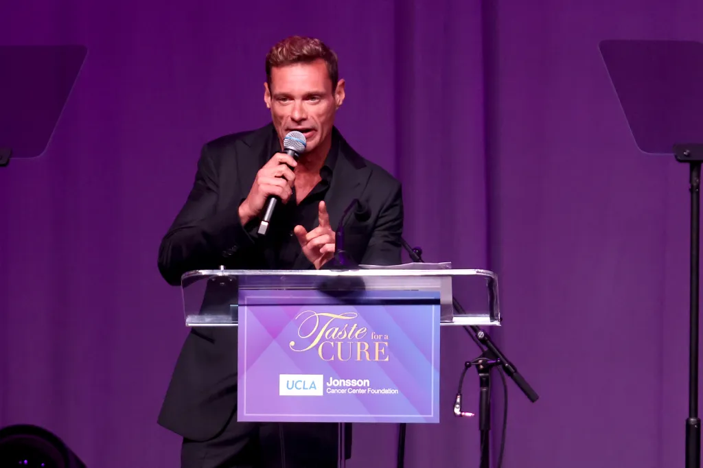 Ryan Seacrest speaking onstage at the 29th Annual UCLA Jonsson Cancer Center Foundation's