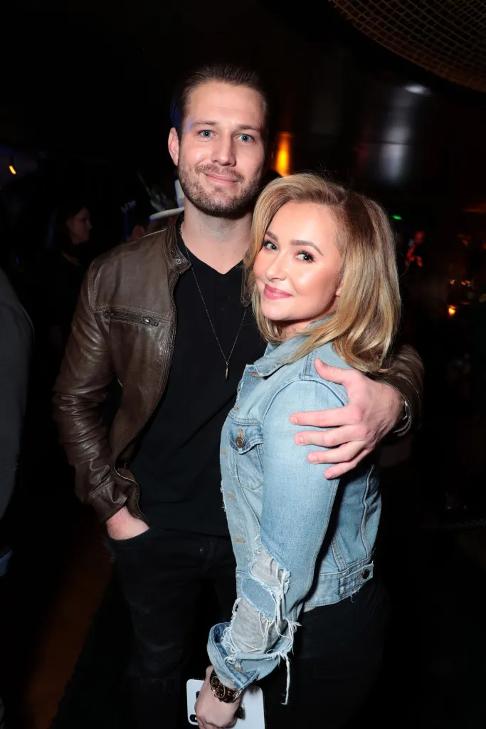 Hayden Panettiere and Brian Hickerson posing for a photo.
