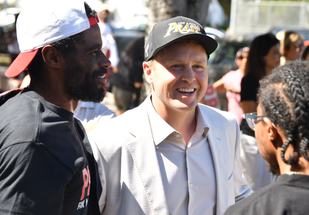 Spencer Pratt, wearing a "Los Angeles Pratt" hat, meets with African American and Latino voters in Tim Gilliam Park.