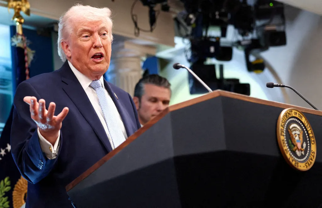 Trump, flanked by Secretary of Defense Pete Hegseth, speaks during a press conference in the James S. Brady Press Briefing Room at the White House in Washington, DC, on April 6, 2026.