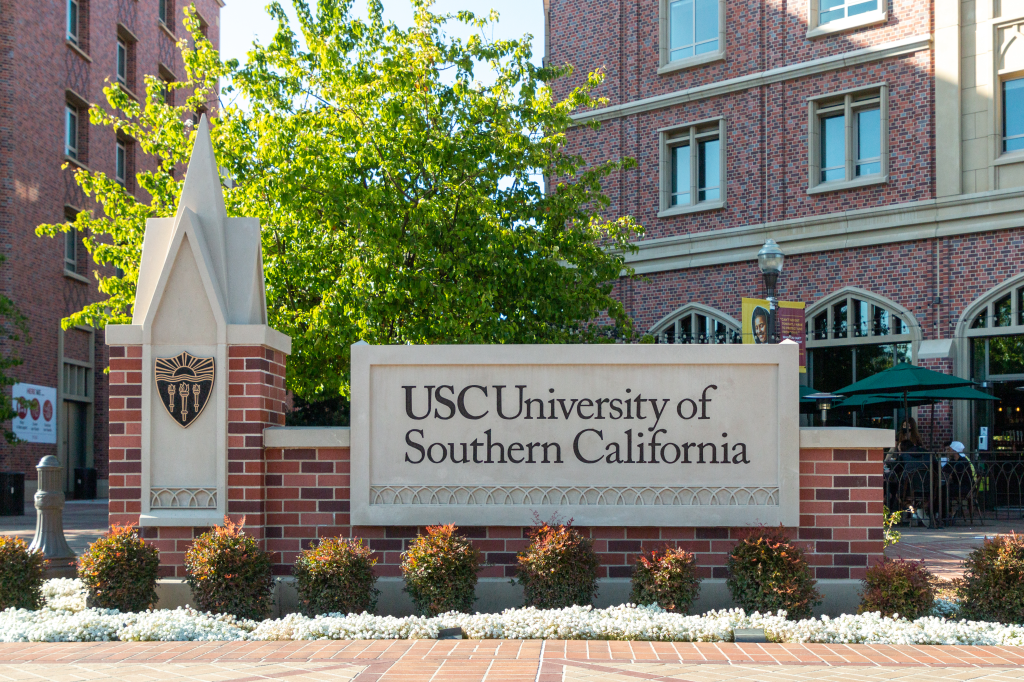 A sign for the University of Southern California with "USC University of Southern California" written on it.